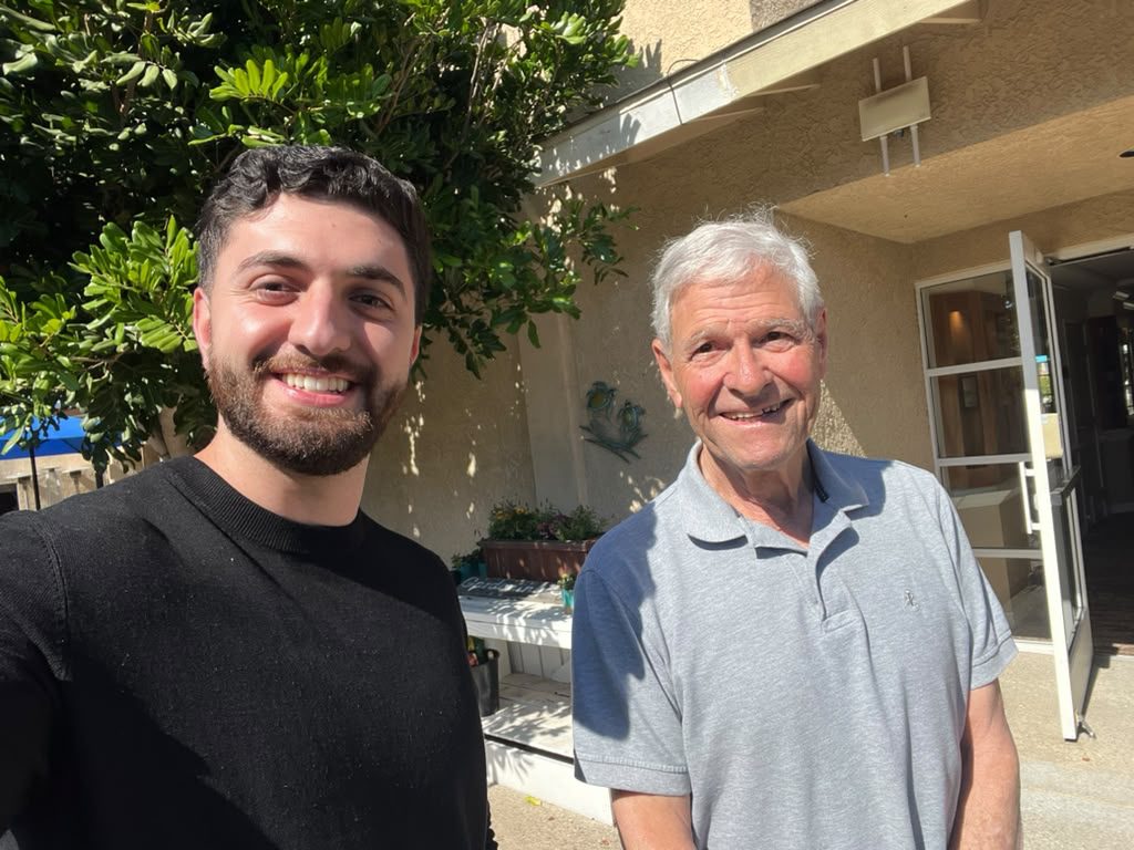 Hassan with a Silverado resident